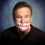 robbin williams with written danger on his mouth