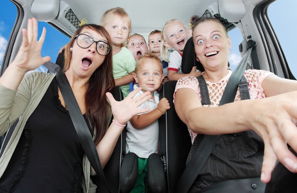 crazy mothers with her children riding on holidays